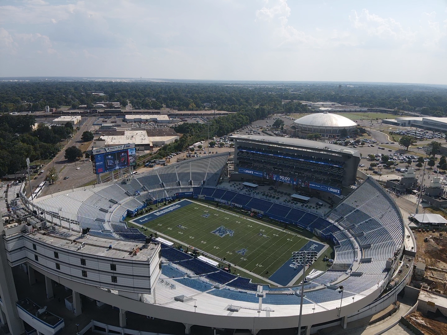 Wide aerial view of Simmons Bank Liberty Stadium and the Memphis skyline
